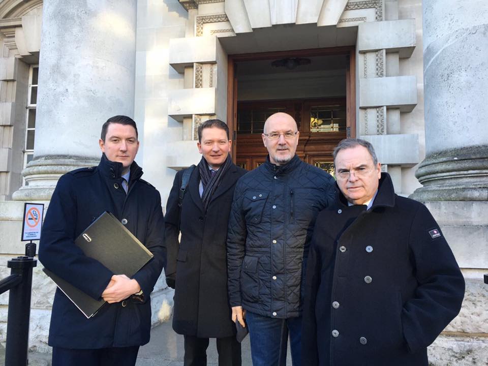 John, Michael and Seamus Finucane with Peter Madden outside Belfast High Court after the conclusion of the legal challenge to the refusal of a public inquiry into the murder of Pat Finucane