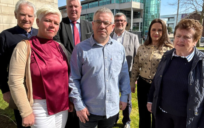 Members of the Cairns family and their solicitor Fearghal Shiels of Madden & Finucane outside Belfast Magistrates’ Court on Friday.