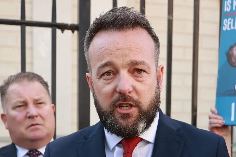 Colum Eastwood MP and Ciarán Shiels of Madden & Finucane